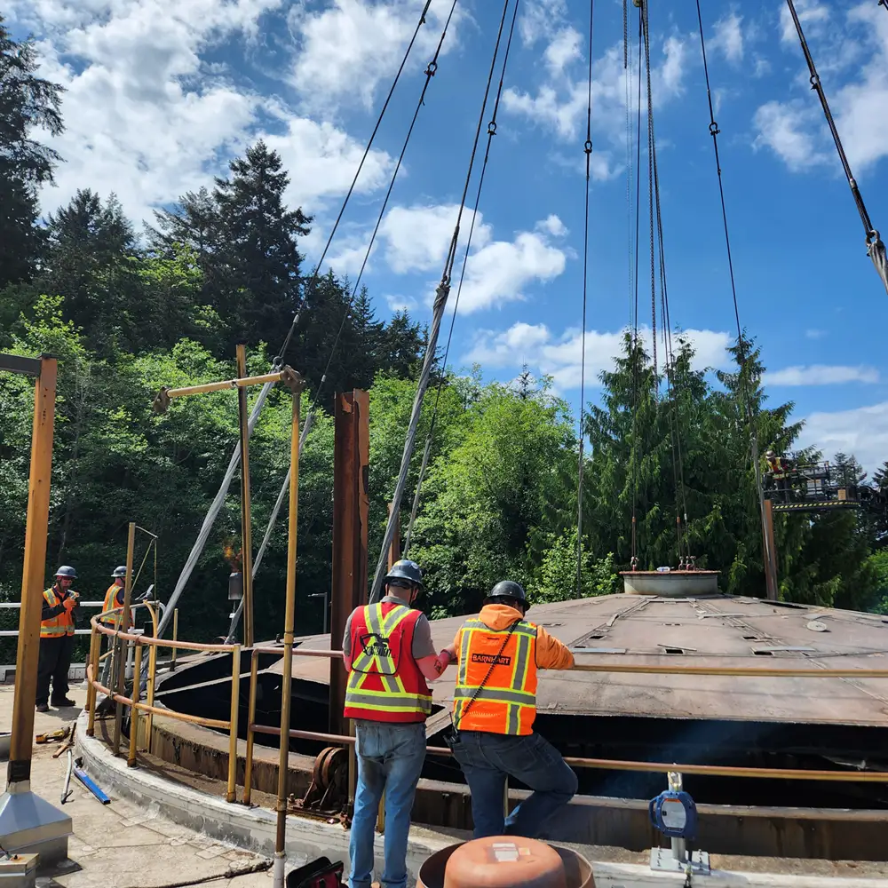 Connecting to crane for tank lid removal | Ascendent Demolition | Federal Way, WA