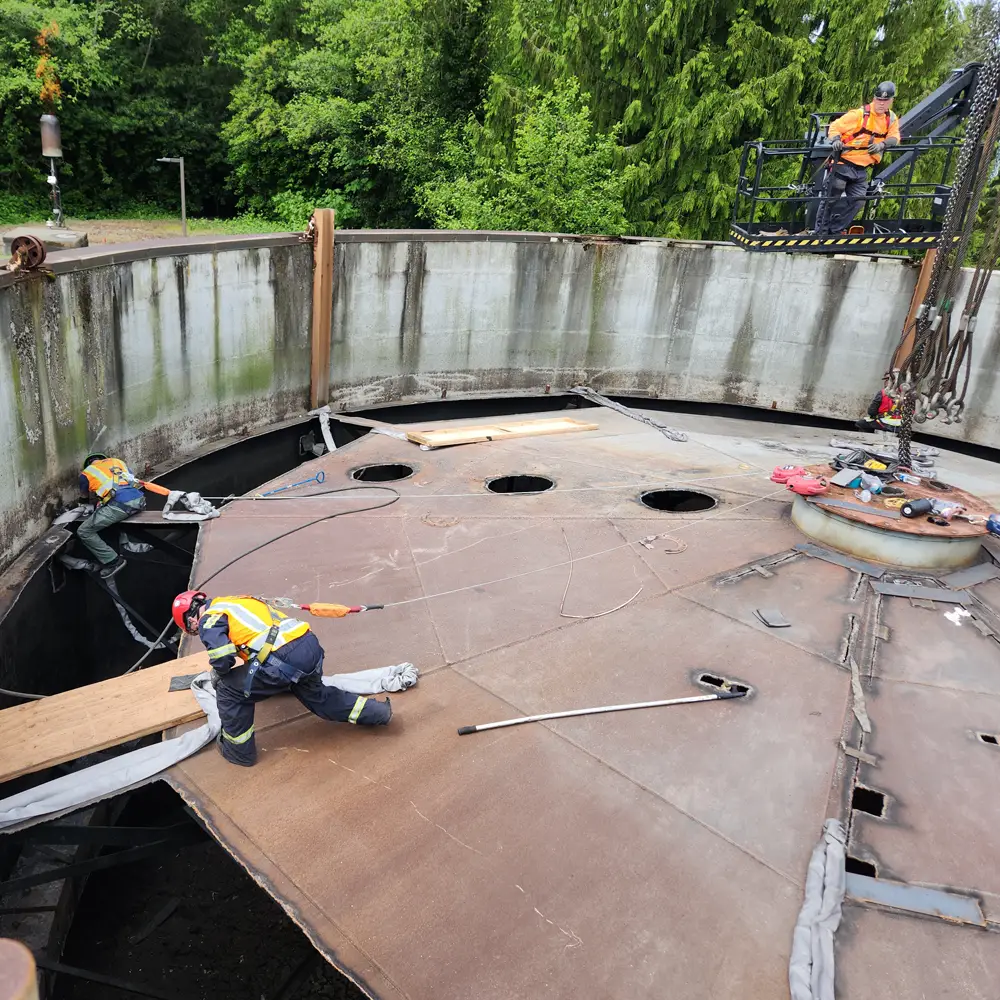 Getting ready to remove tank lid | Ascendent Demolition | Federal Way, WA