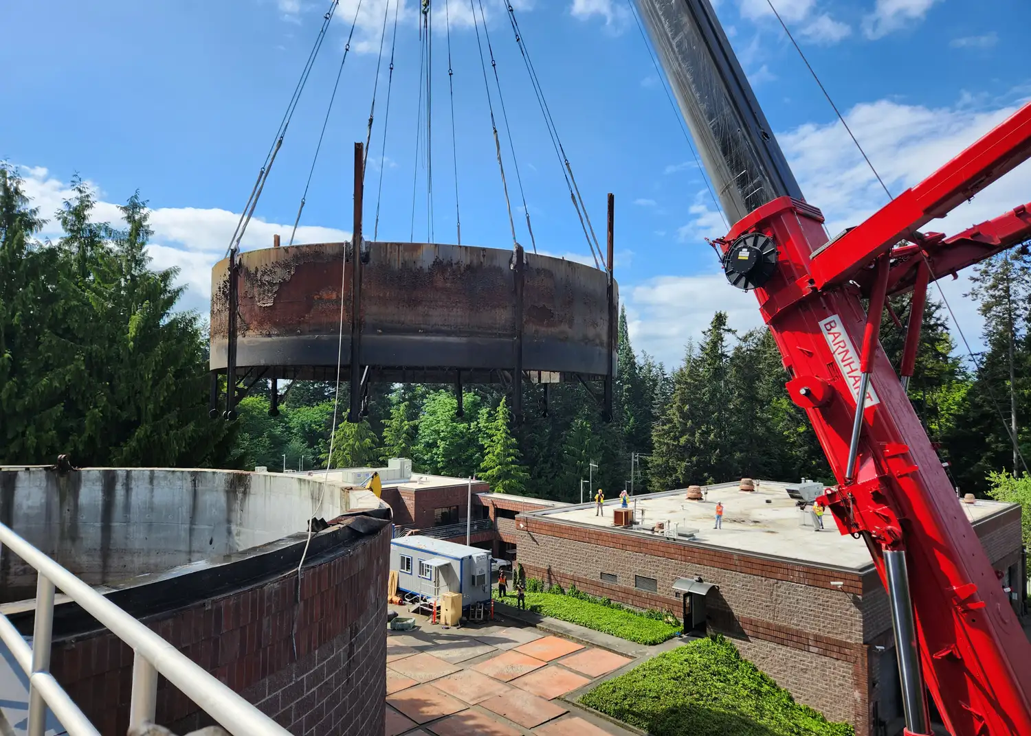 Lifting tank lid off by crane | Ascendent Demolition | Federal Way, WA